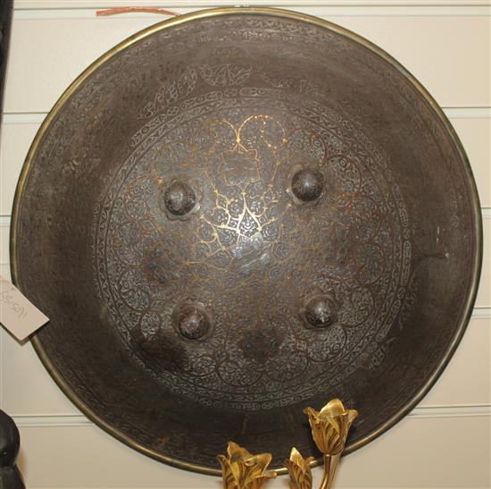 An Indo Persian chiselled steel circular dhal,